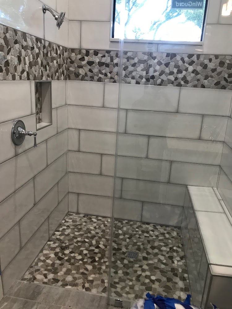 Desouza's Tile Inc